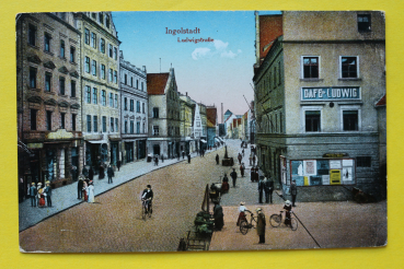 AK Ingolstadt / 1910-1920 / Ludwigstrasse / Cafe Ludwig / Strassenansicht / Fahrräder Geschäfte Werbewand